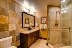 Water House Condominiums master bathroom with separate shower and tub